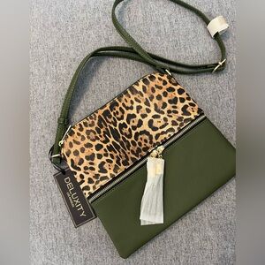New with tags crossbody bag. Forest Green and‎ leopard print.